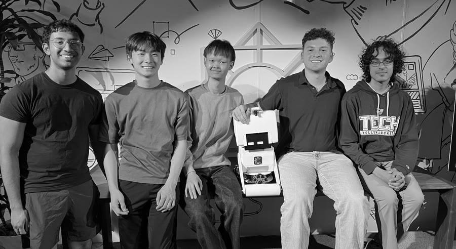 MoBot, a self-built cleaning robot, with its team at South Park Commons